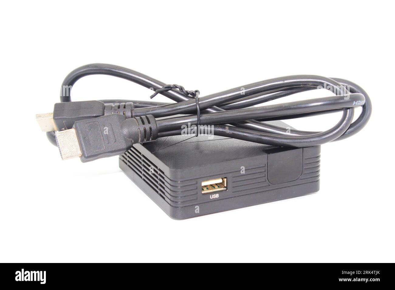 A digital setup box for tv with cables isolated on a white background Stock Photo Alamy