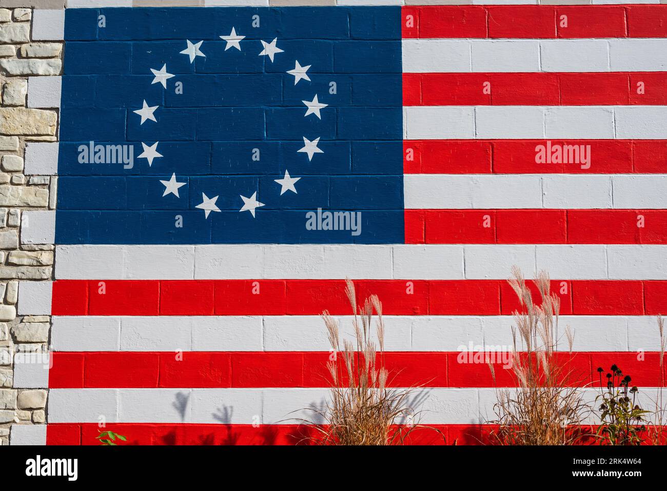 The us flag painted on the wall of a post office building on Washington