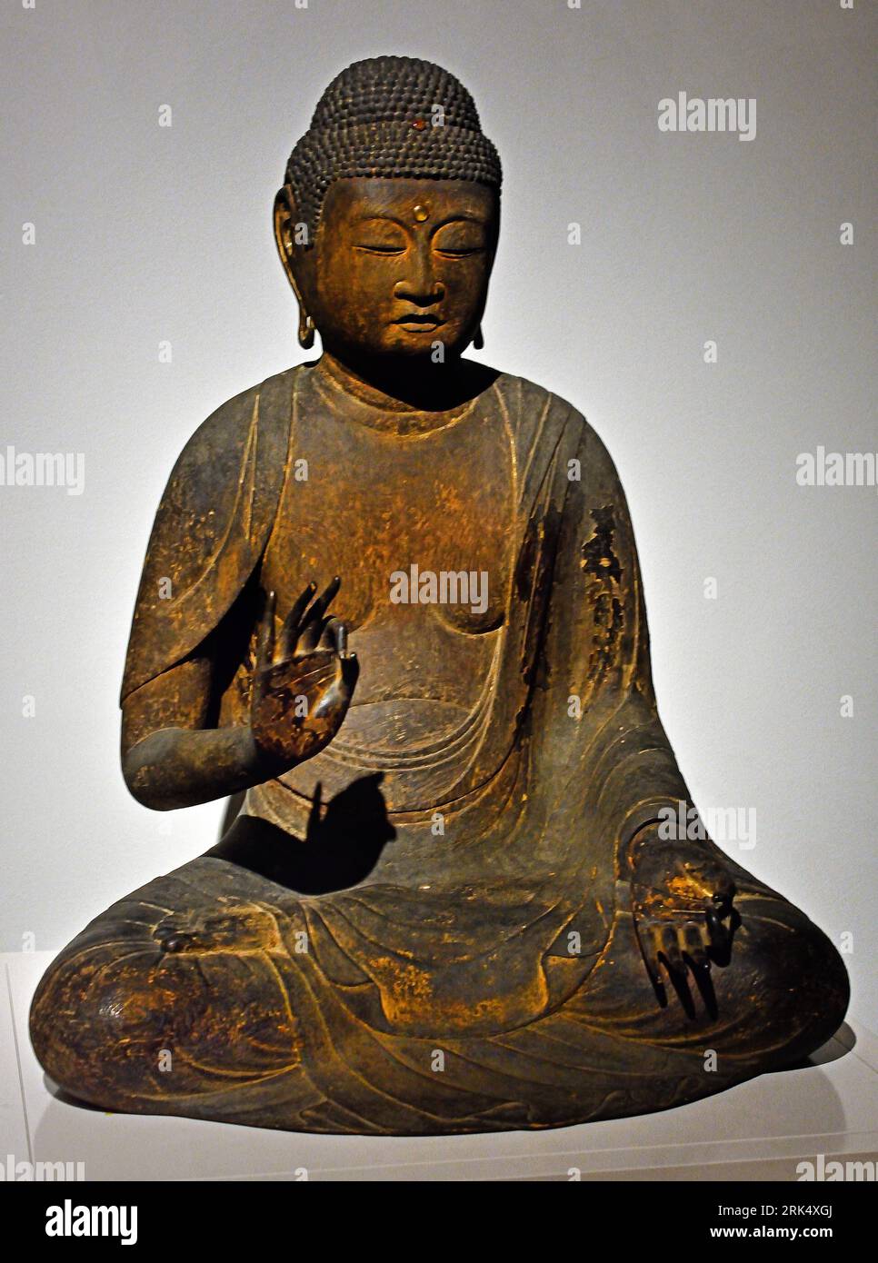 Amida Nyorai (Buddha Amitabha), sitting in the lotus position. 1125 - 1751 12th Century  Japan wood, traces of lacquer,  87cm × 71. cm  56.5cm representations ~ gods, demi-gods, heroes, etc. (Hinduism, Buddhism, Jainism) Rijksmuseum Amsterdam Stock Photo