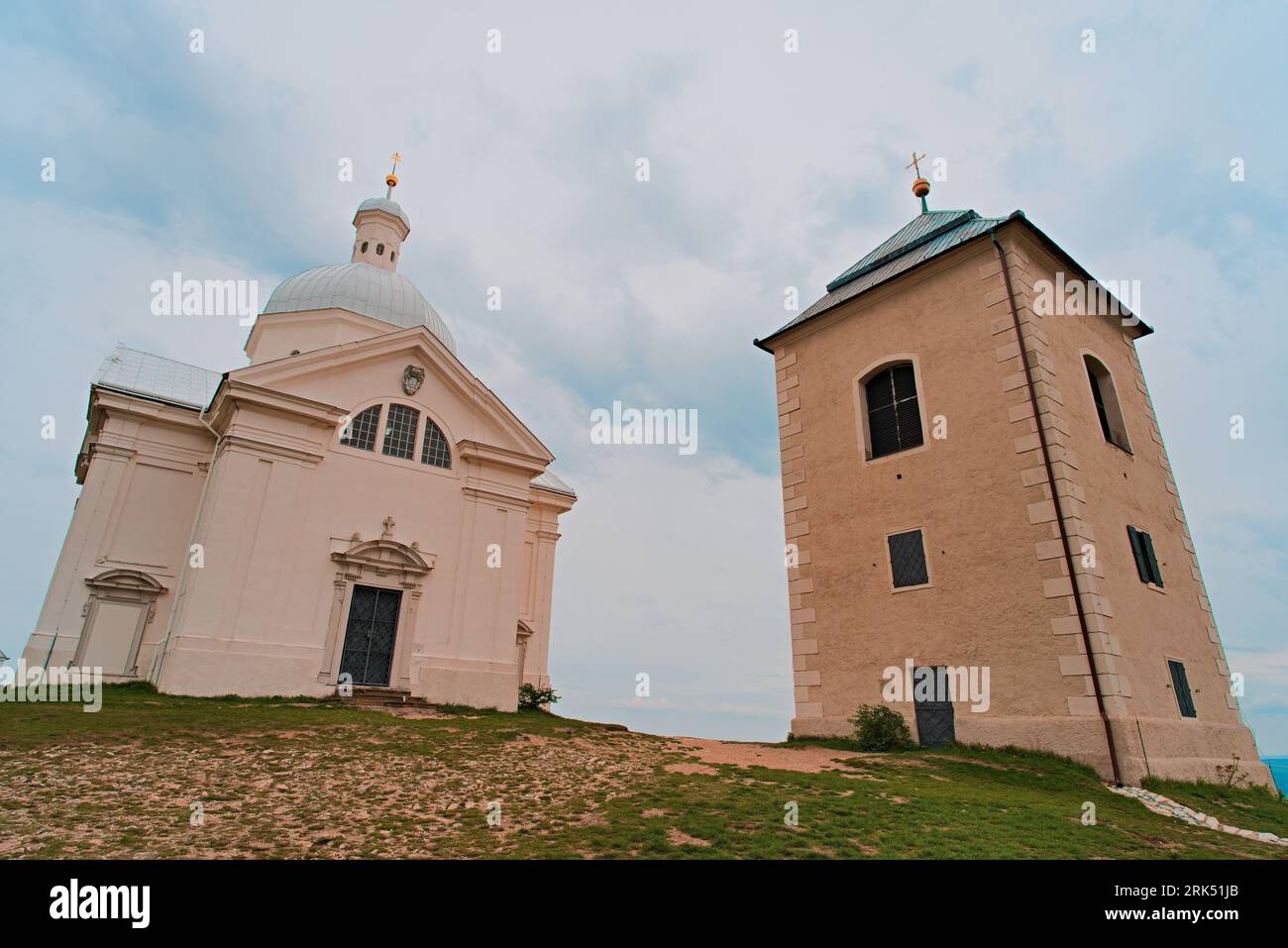 A low angle of two churches on a hillside in Mikulov, South Moravia, Czech Republic Stock Photo