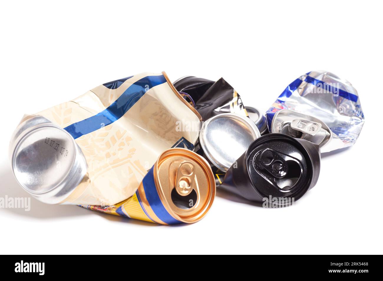 Empty crumpled cans from energy drink or beer. Stock Photo