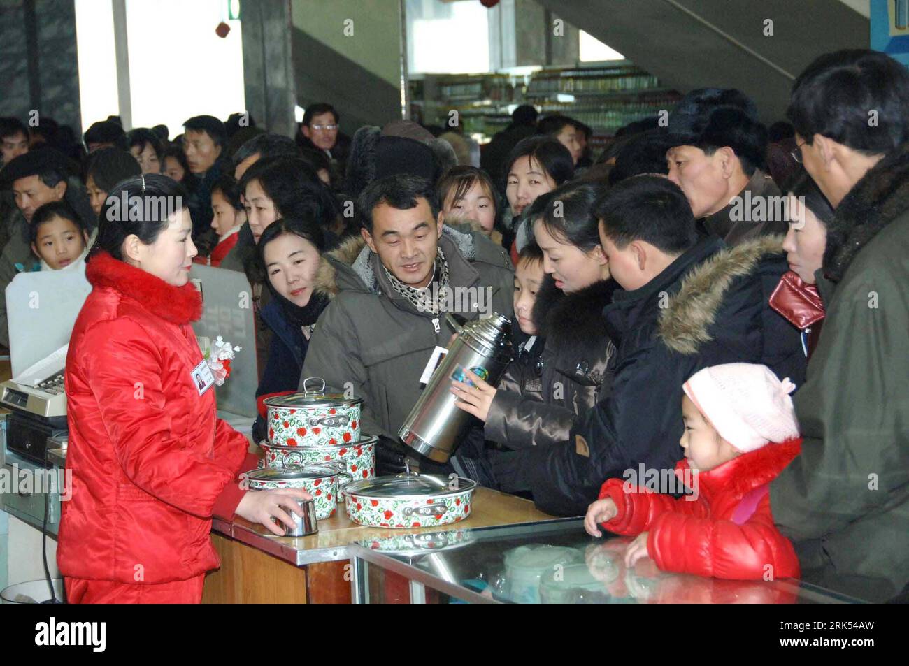 Bildnummer: 53693465  Datum: 01.01.2010  Copyright: imago/Xinhua (100101) -- PYONGYANG, Jan. 1, 2010 (Xinhua) -- Service staffs provide and other commodities to citizens during the new year time in Pyongyang in this picture released by Korean Central News Agency (KCNA) on Jan. 1, 2010. (Xinhua/KCNA) (cy) (1)DPRK-PYONGYANG-NEW YEAR PUBLICATIONxNOTxINxCHN Silvester Neujahr neues Jahr Jahreswechsel kbdig xcb 2010 quer    Bildnummer 53693465 Date 01 01 2010 Copyright Imago XINHUA  Pyongyang Jan 1 2010 XINHUA Service staffs provide and Other Commodities to Citizens during The New Year Time in Pyong Stock Photo