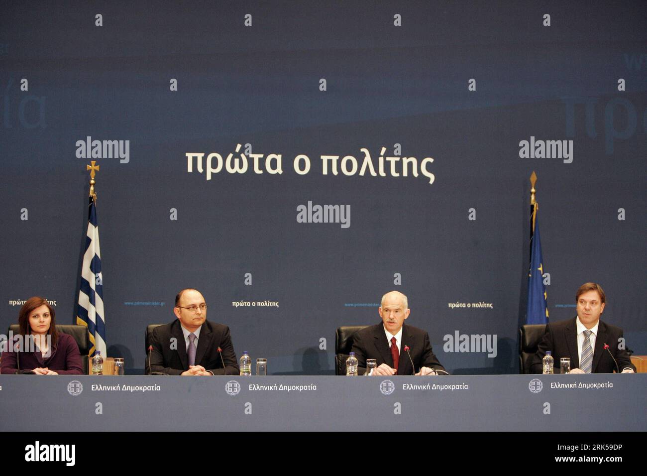 Bildnummer: 53724848  Datum: 13.01.2010  Copyright: imago/Xinhua (100113) -- ATHENS, Jan. 13, 2010 (Xinhua) -- Greek Prime Minister George Papandreou (2nd R) speaks during a press conference held on the day his socialist government completes 100 days in office in Athens, capital of Greece, Jan. 13, 2010. The unprecedented size of the economic crisis Greece faces today demands urgent, bold, historic measures and Greece can win the challenge alone, George Papandreou said on Wednesday. (Xinhua/Marios Lolos) (gxr) (5)GREECE-ATHENS-PM-PRESS CONFERENCE PUBLICATIONxNOTxINxCHN People Politik premiumd Stock Photo