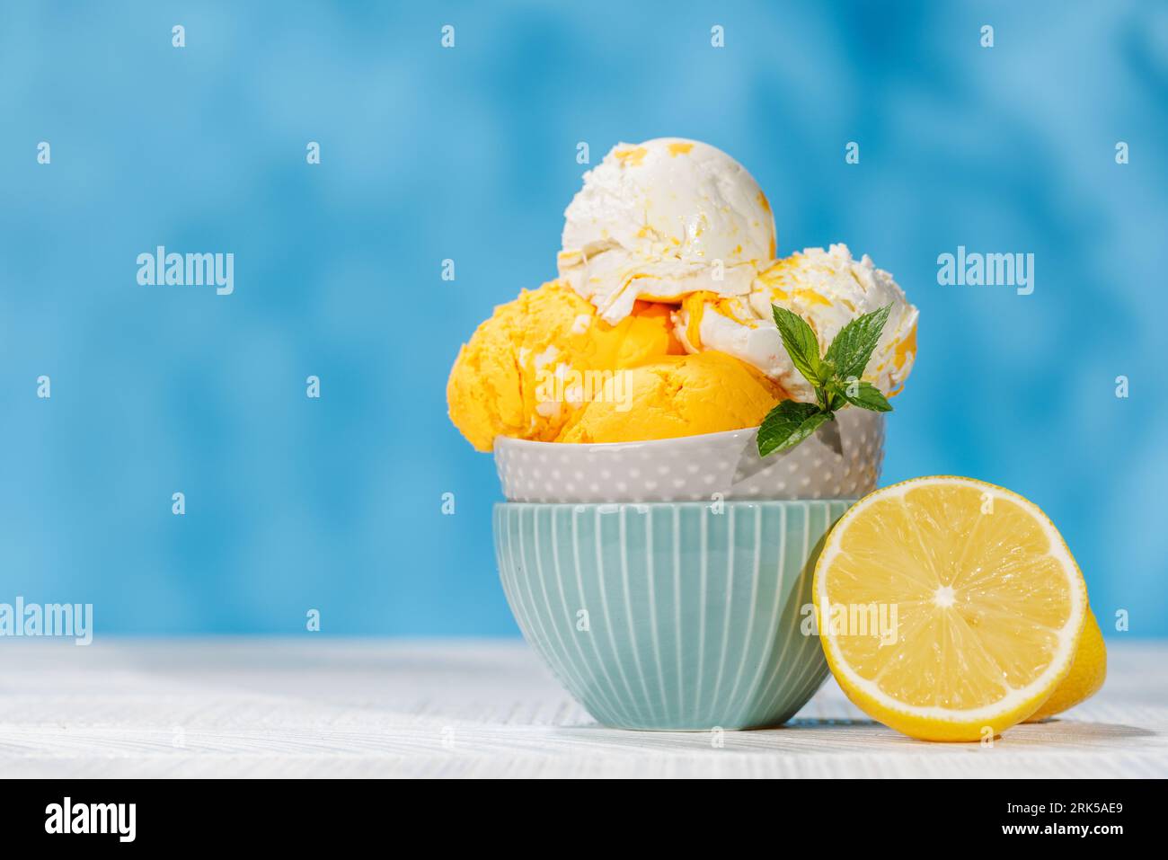 Refreshing ice cream scoops treats with a hint of zesty lemon flavour