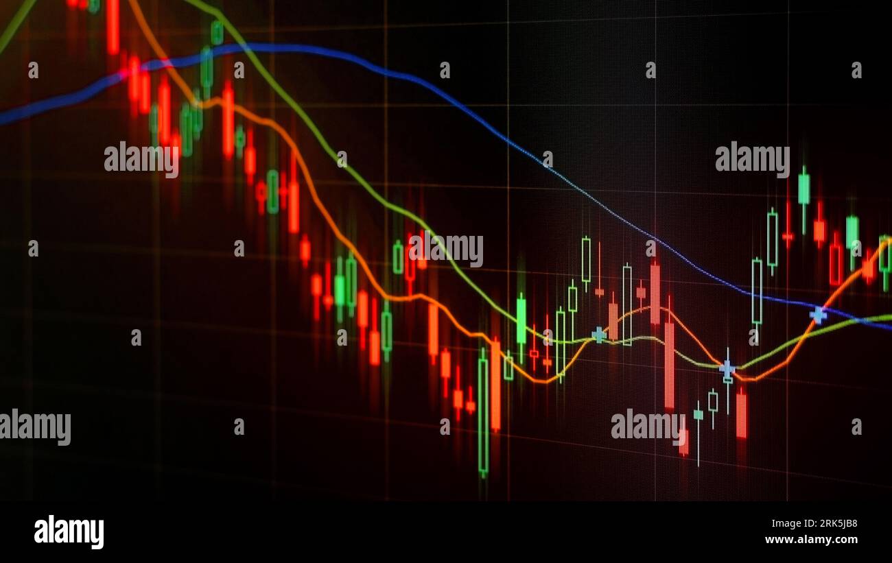 A descending financial graph on a black background Stock Photo - Alamy
