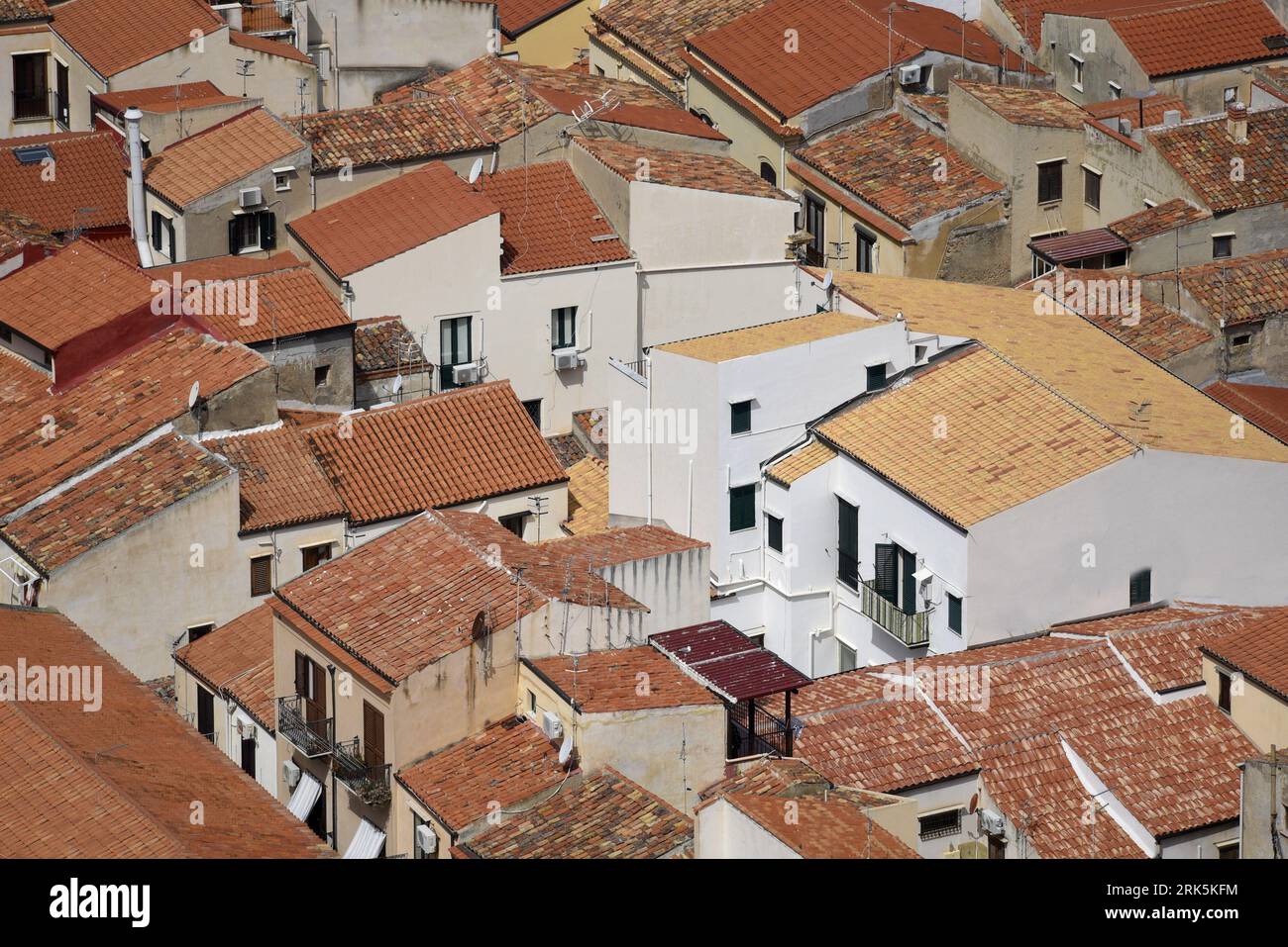 Scenic view of red clay tile rooftops in Cefalù one of the most ...