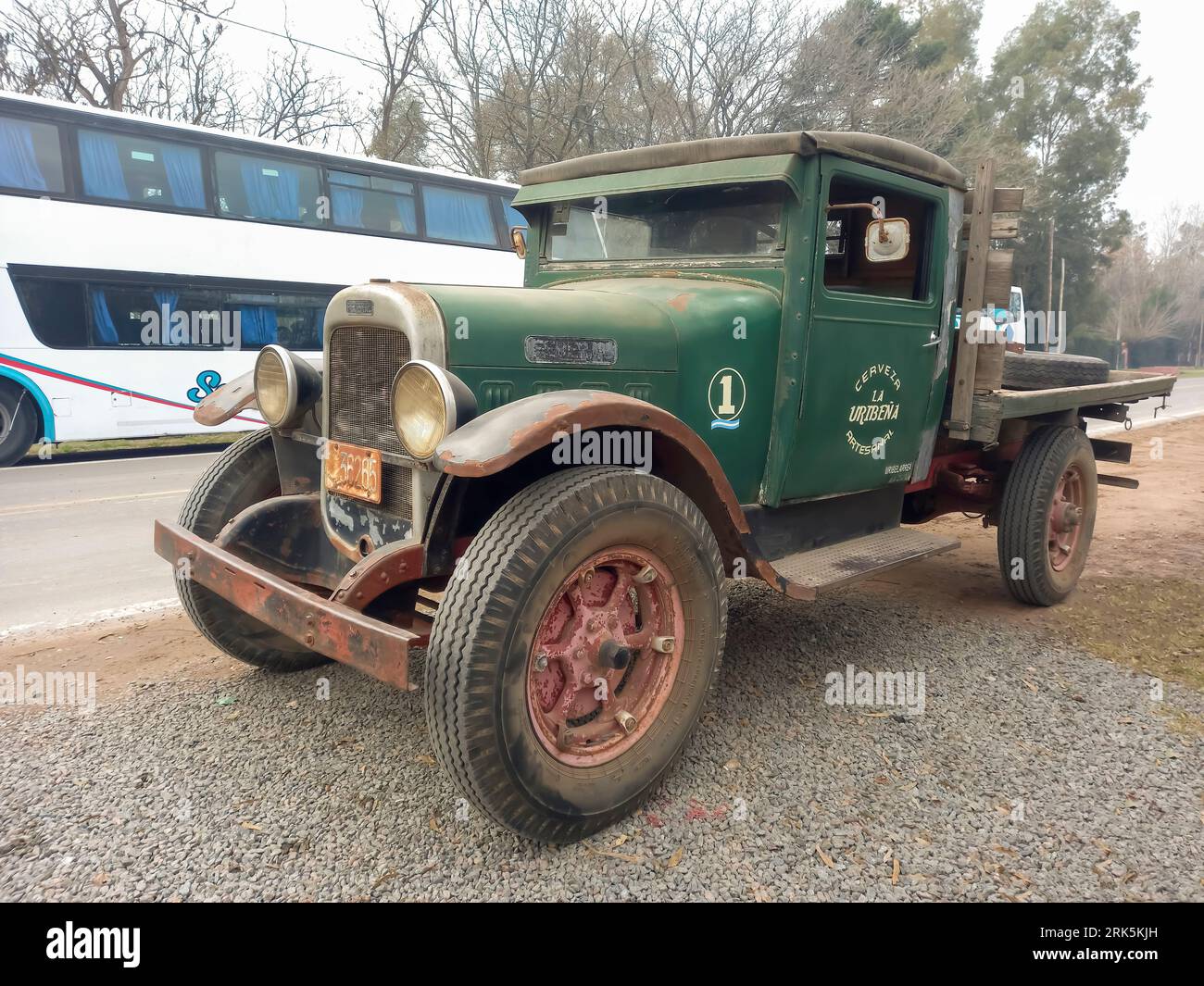 Uribelarrea, Argentina - Jul 15, 2023: old rusty unpainted 1932 Federal Motor classic flatbed truck in a rural road Stock Photo