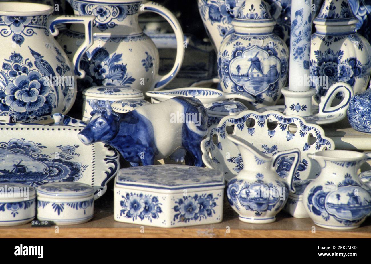DELFT,HOLLAND- AUGUST 14,2023:Typical Delft blue in a souvenir shop in Delft, The Netherlands. Some of them are antique but the others are not very ol Stock Photo