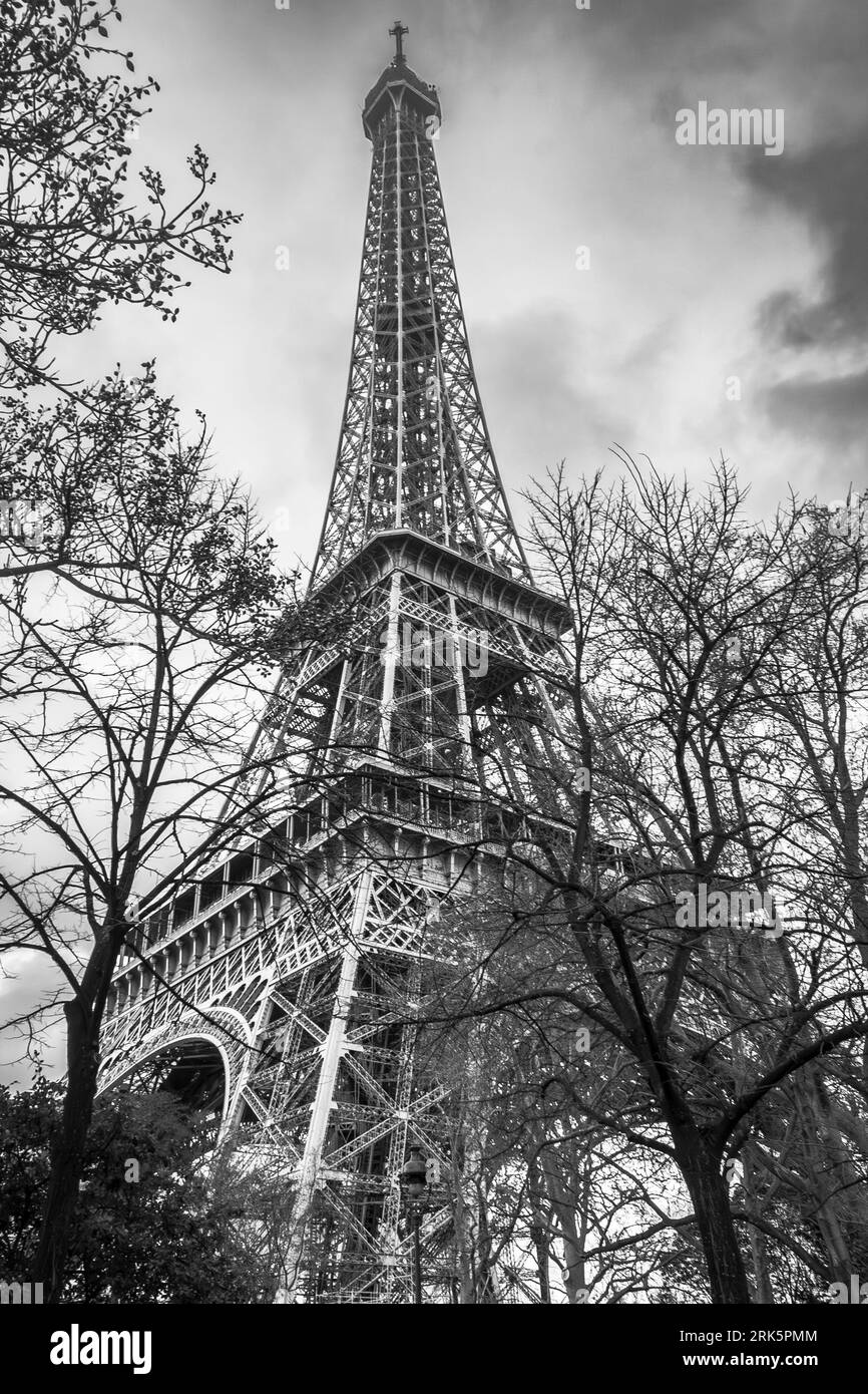 Black and white image of the Eiffel Tower on a cloudy winter's day Stock Photo