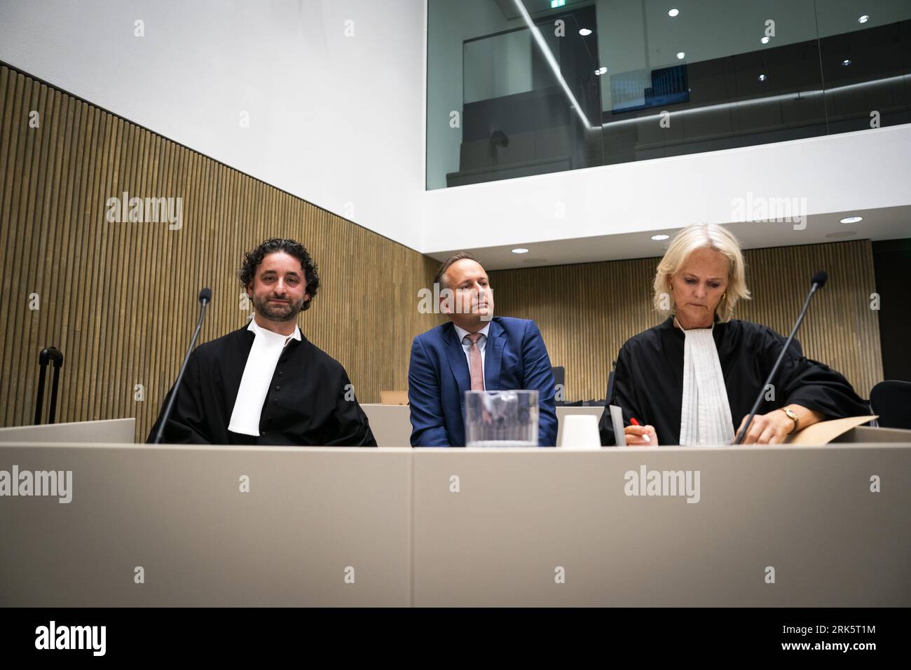 AMSTERDAM - Party chairman of Volt, Rob Keijsers (m) with lawyers in court for a hearing in the case of Gündogan against Volt about defamation and slander. Gundogan has been expelled from Volt's faction following allegations of misconduct. She resisted and was proved right by the judge, allowing her to return to the Volt faction. The party then appealed and won. ANP JEROEN JUMELET netherlands out - belgium out Stock Photo