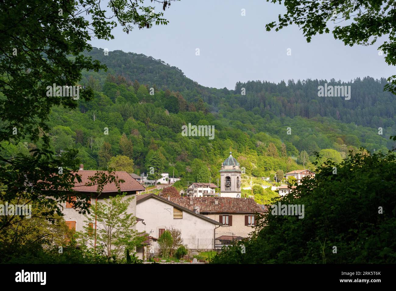 A scenic view of residential buildings in a small town in green ...