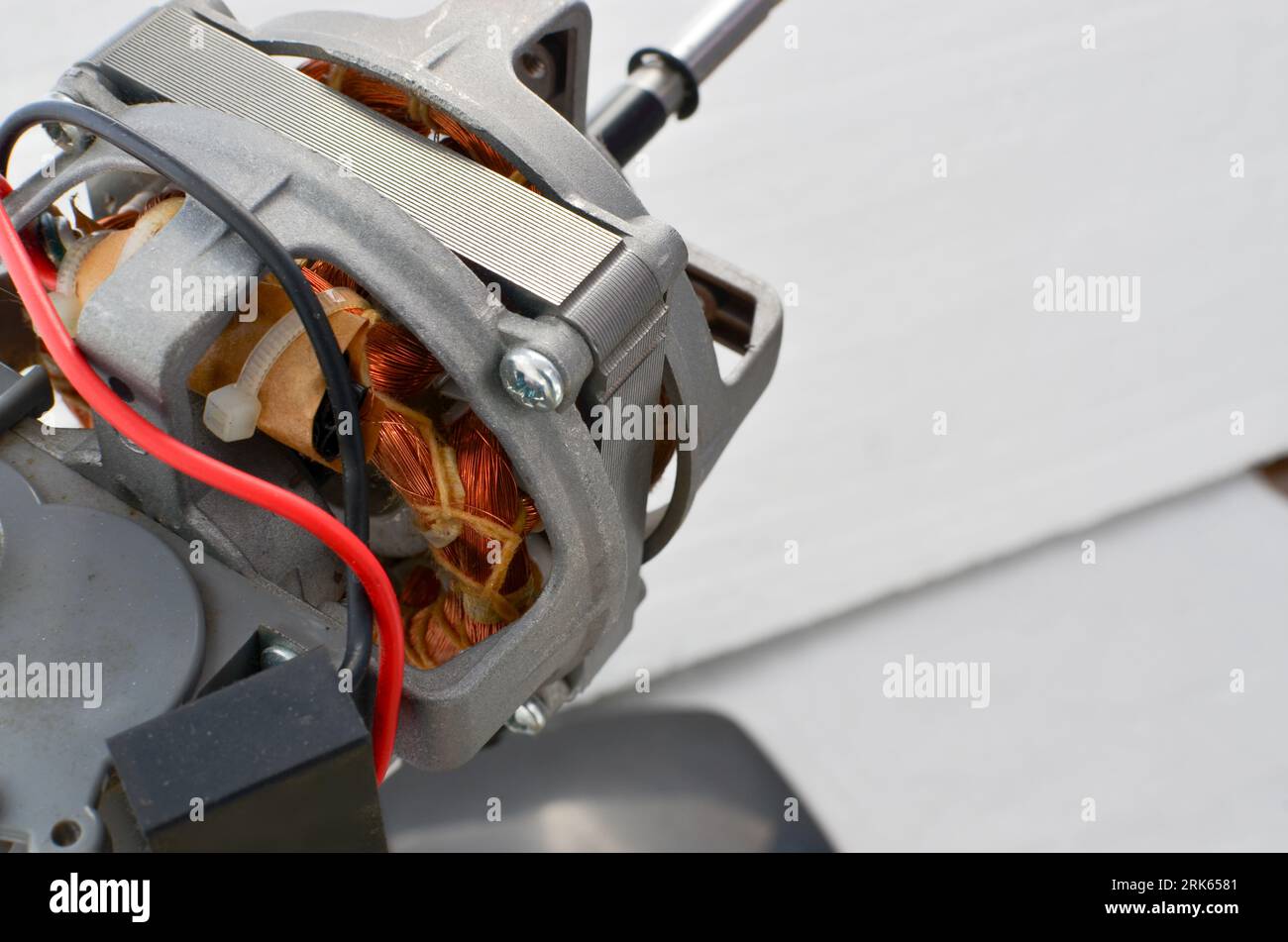 Detail of a domestic table fan motor, representing the concept of
