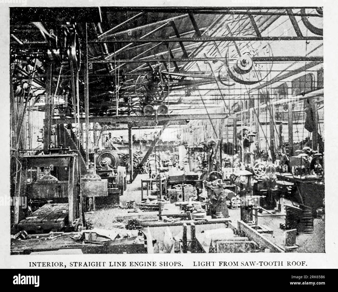 Interior Sweet's Straight Line Engine Shops, Syracuse NY, Light from Saw Tooth Roof from the Article MODERN MACHINE-SHOP ECONOMICS PRIME REQUISITES OF SHOP CONSTRUCTION By Horace L. Arnold from The Engineering Magazine DEVOTED TO INDUSTRIAL PROGRESS Volume XI October 1896 NEW YORK The Engineering Magazine Co Stock Photo