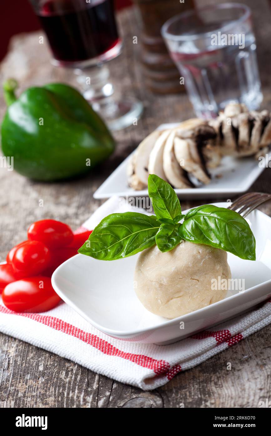 yeast dough with basil leaf Stock Photo