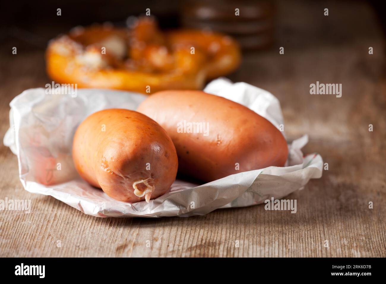 two bavarian sausages on wood Stock Photo