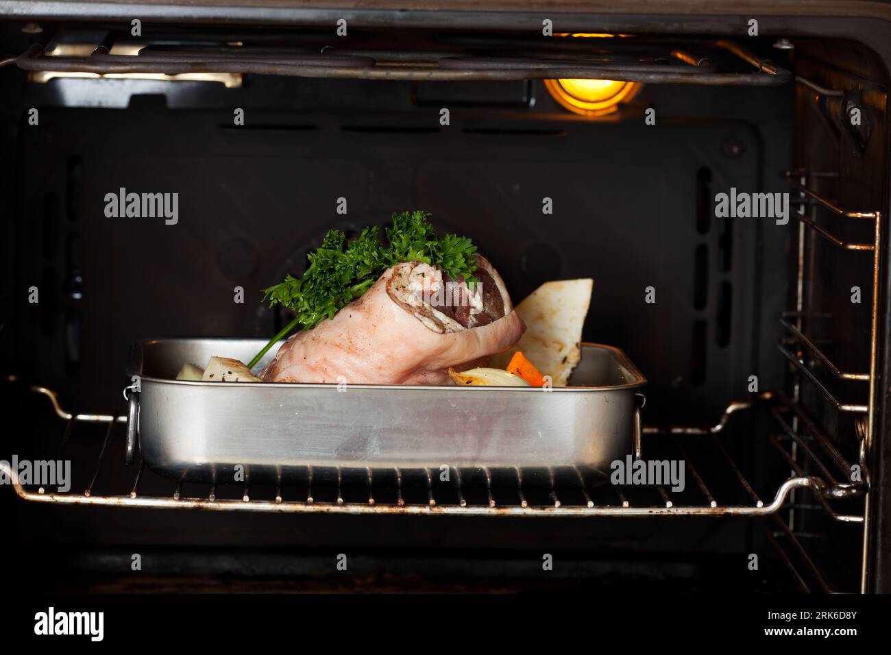 knuckle of pork in the oven Stock Photo