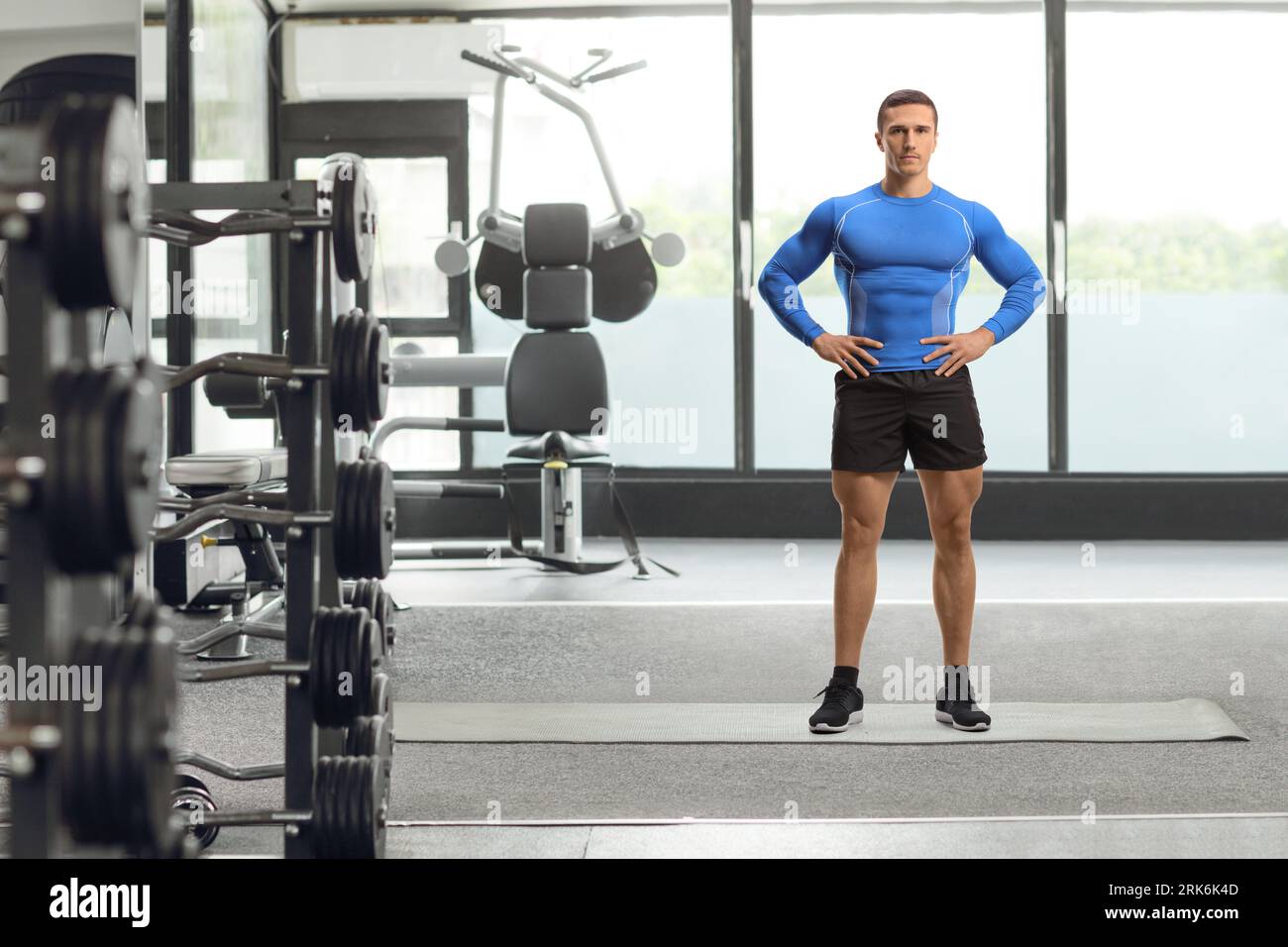 Full length portrait of a bodybuilder posing at the gym Stock Photo