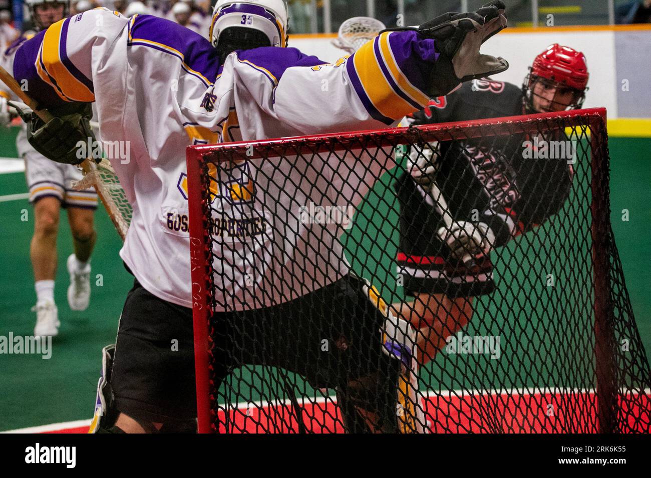 Edmonton, Canada. 22nd Aug, 2023. Burlington Blaze (black/orange) Josh Rosa (12) fires a shot on Coquitlam Adanacs goaltender (White/Yellow) Jack Kask (35) during the Minto Cup between Burlington Blaze and Coquitlam Adanacs at Bill Hinter Arena. Final score; Burlington Blaze 10:8 Coquitlam Adanacs. Credit: SOPA Images Limited/Alamy Live News Stock Photo