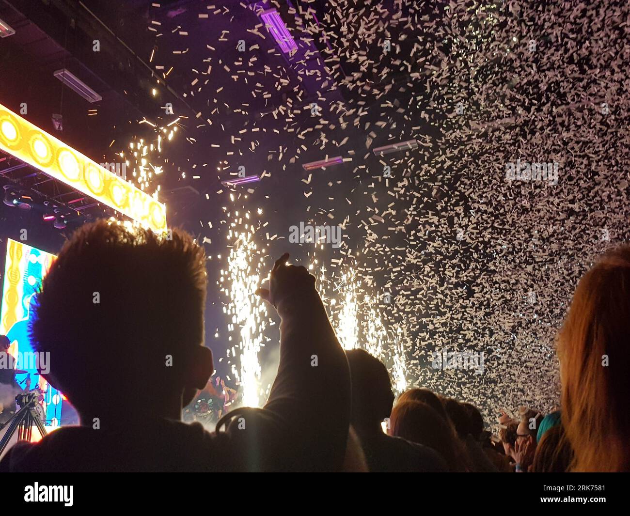 A group of people gather together to watch a spectacular show during a ...