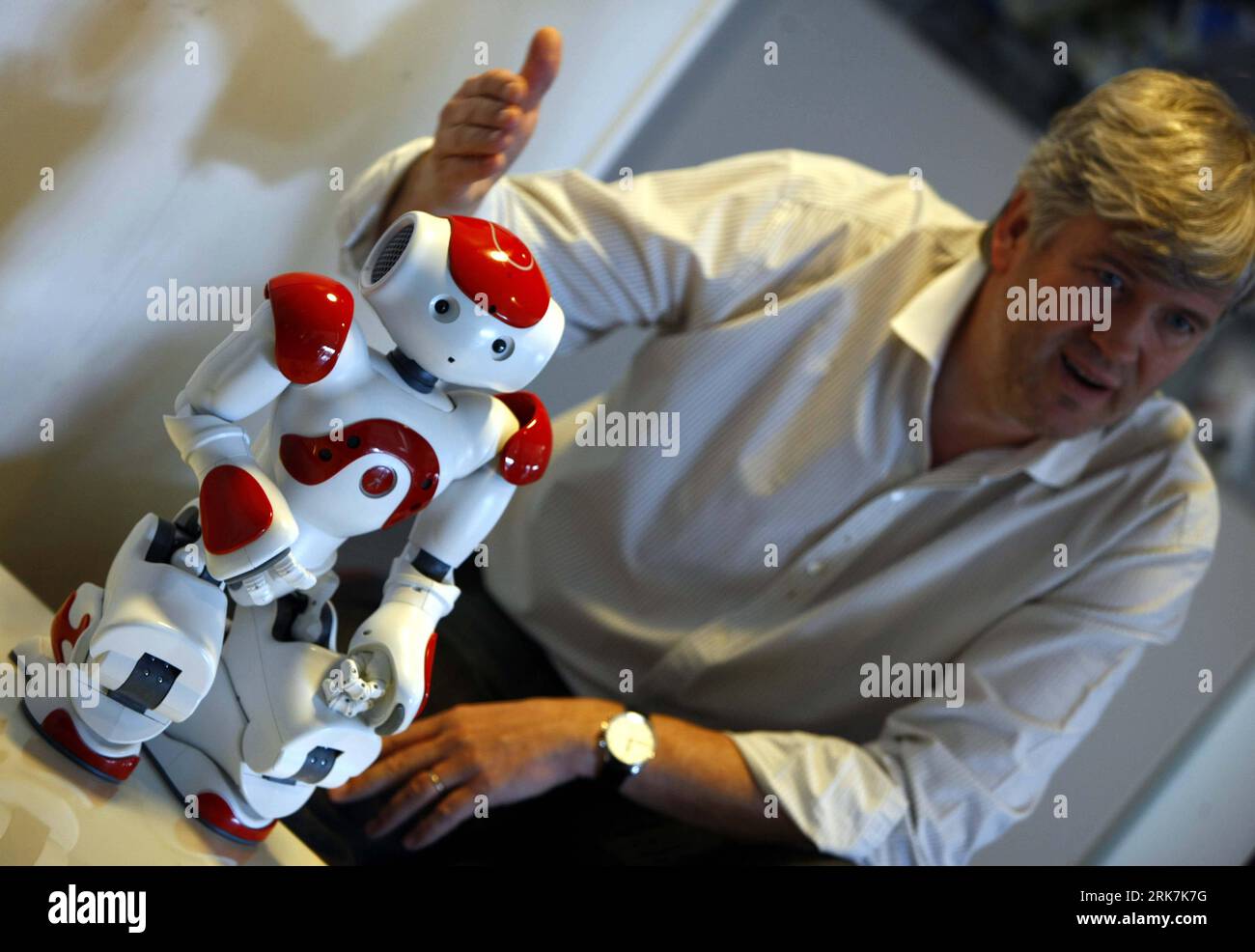 Bildnummer: 53923449  Datum: 06.04.2010  Copyright: imago/Xinhua (100407) -- PARIS, April 7, 2010 (Xinhua) -- France s Aldebaran Company President Bruno Maisonnier displays a robot named Nao in Paris April 6, 2010. The robot developed by Aldebaran can speak fluent English, French and Chinese. It will be displayed at the Shanghai World Expo as the mascot of French Pavilion. (Xinhua/Zhang Yuwei) (dyw) (1)FRANCE-PARIS-ROBOT-SHANGHAI WORLD EXPO PUBLICATIONxNOTxINxCHN Gesellschaft Wirtschaft Weltausstellung Roboter kbdig xub 2010 quer o0 People    Bildnummer 53923449 Date 06 04 2010 Copyright Imago Stock Photo
