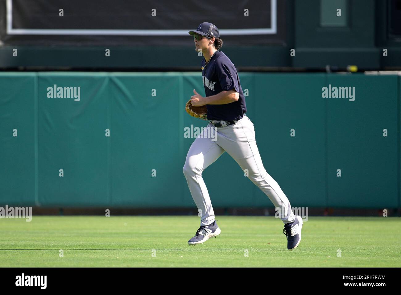 New York Yankees outfielder Spencer Jones runs off of the field during