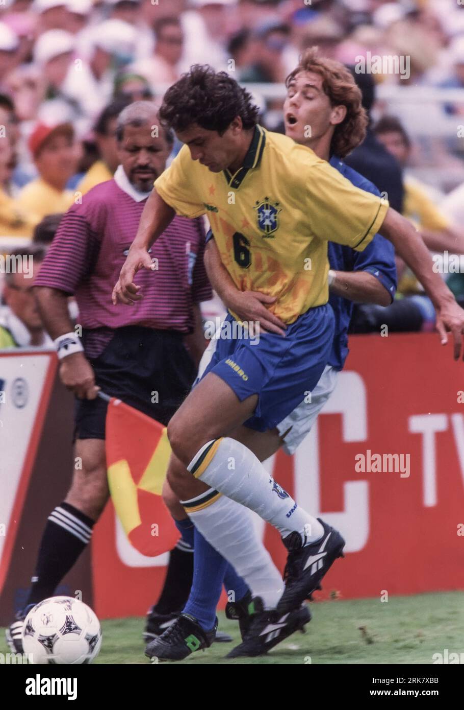 Branco of Brazil tangles with Roberto Mussi of Itlay in the final of the 1994 World Cup Stock Photo