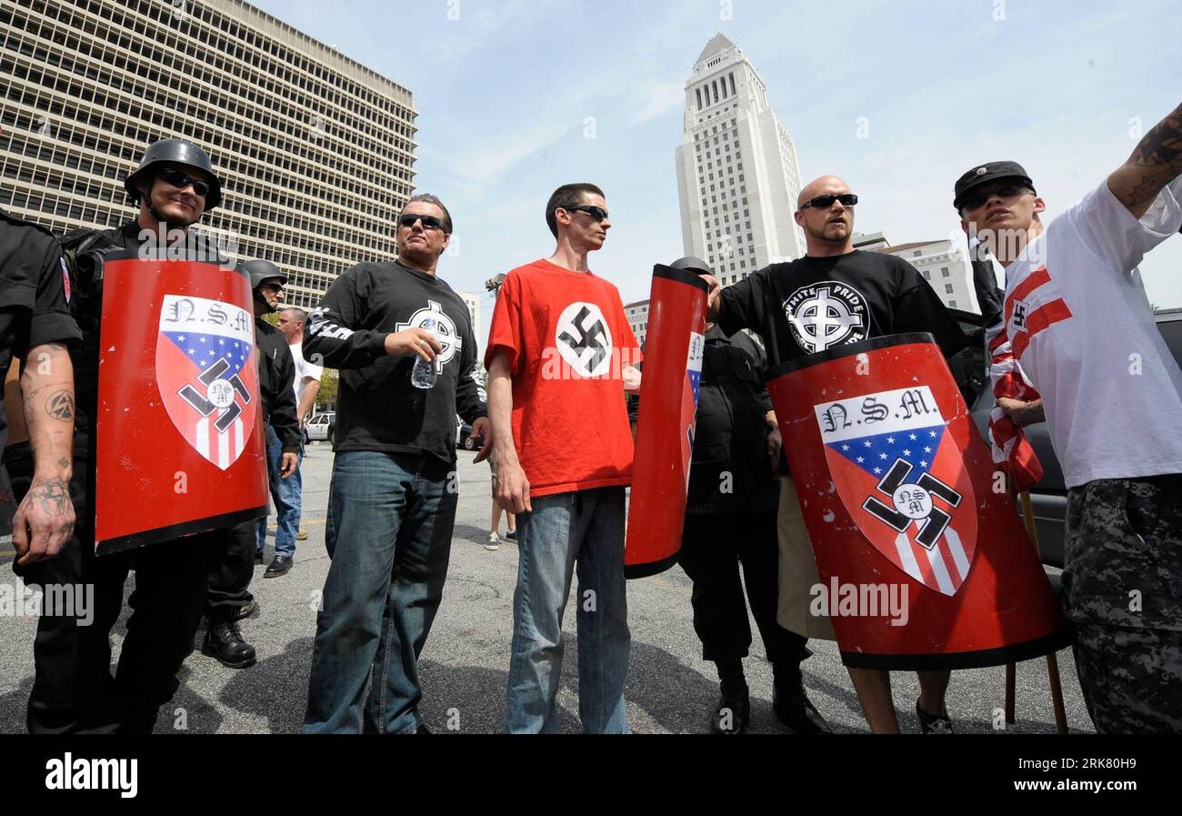 Bildnummer: 53948535  Datum: 17.04.2010  Copyright: imago/Xinhua (100418) -- LOS ANGELES, April 18, 2010 (Xinhua) -- Memebers of a white supremacist group so-called National Socialist Movement attend a rally in front of City Hall in downtown Los Angeles, the United States, April 17, 2010. Five were arrested by police after a bloody scuffle brought a white supremacist rally to an abrupt end in downtown Los Angeles on Saturday. Hundreds of from the counter-protesting groups, consisting of black, Latino and Asian ethnic descents, threw rocks and bottles at around 40 members of the so-called Natio Stock Photo