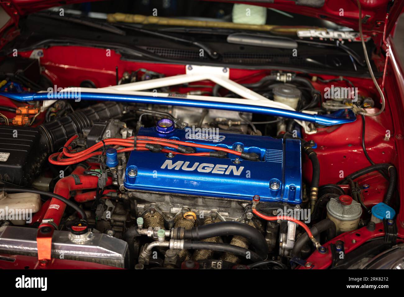 Detail of the modified Mugen engine of the red Honda CR-X Del Sol parked in the parking lot Stock Photo