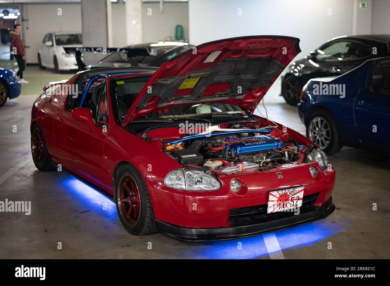 Detail of the modified Mugen engine of the red Honda CR-X Del Sol parked in the parking lot Stock Photo