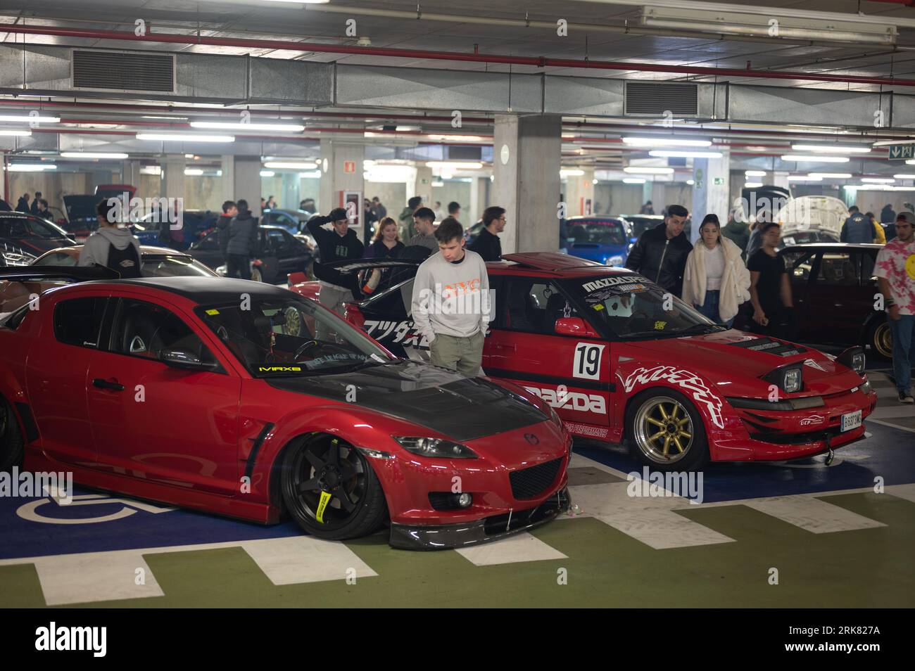 Red Mazda RX8 and Mazada 323f modified for street racing Stock Photo