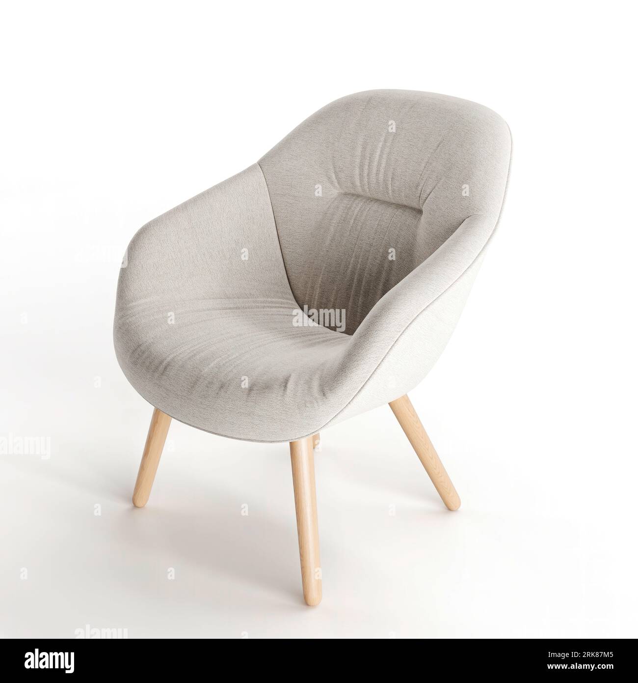 A minimalist grey armchair with four wooden legs sitting on a bright