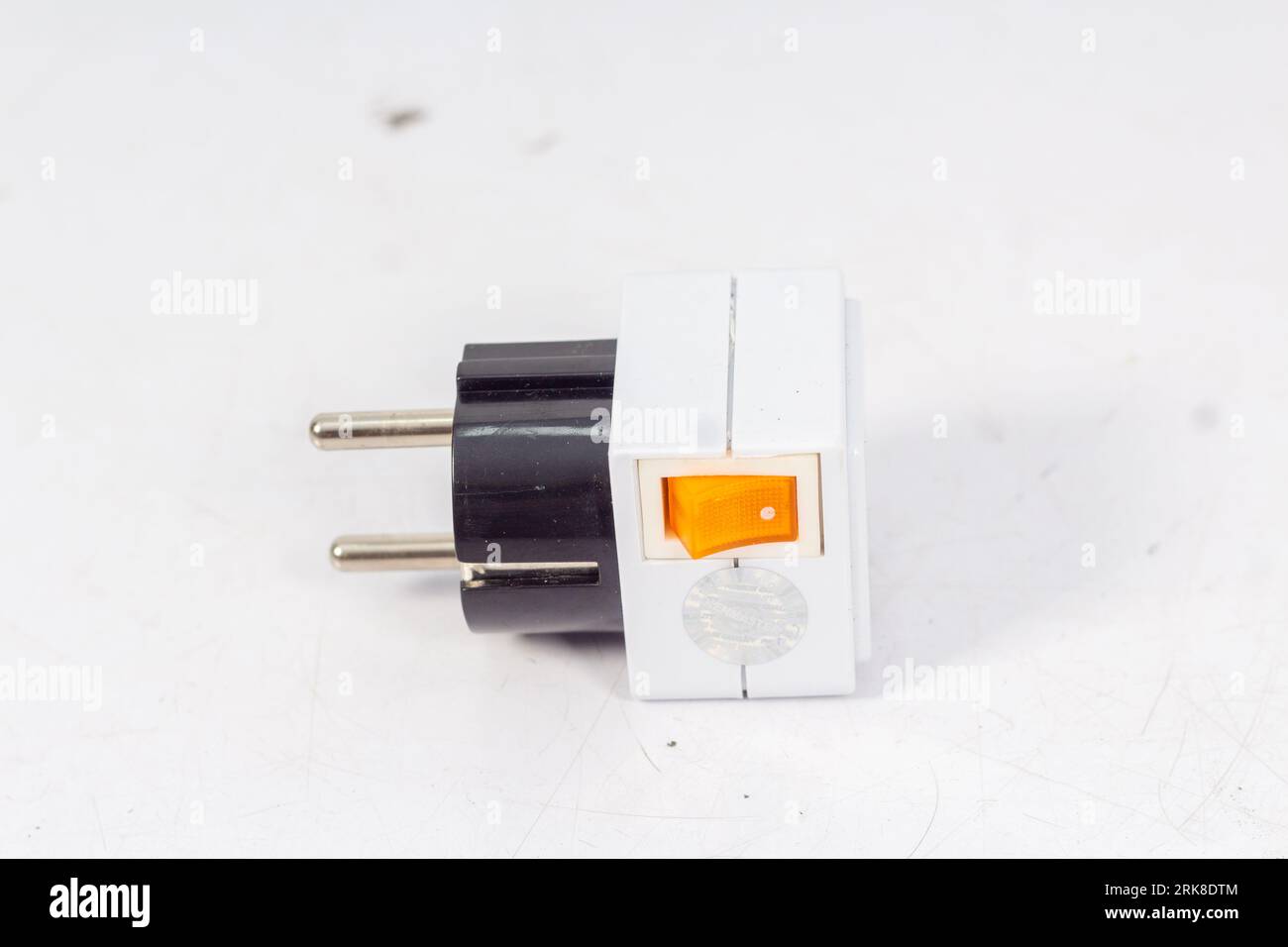 Close up of universal electric socket plug adapters, isolated on white