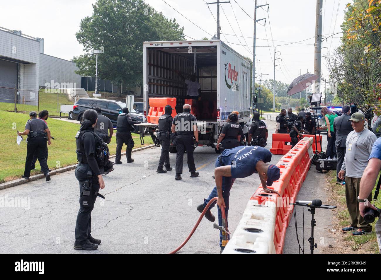 Atlanta, United States. 24th Aug, 2023. Sheriff's deputies set up barricades outside the Fulton County Jail in Atlanta, Georgia on Thursday, August 24, 2023. Former president Donald Trump is expected to surrender Thursday evening on racketeering and conspiracy charges over his efforts to overturn the results of the 2020 presidential election in Georgia. Photo by Anthony Stalcup/UPI Credit: UPI/Alamy Live News Stock Photo