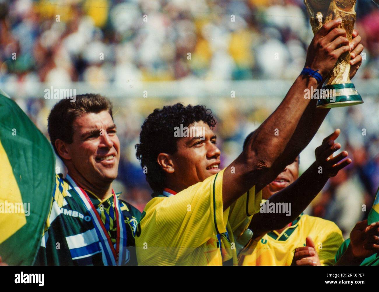 Brazilian soccer player Marcio Roberto Dos Santos with the 1994 FIFA World Cup trophy Stock Photo