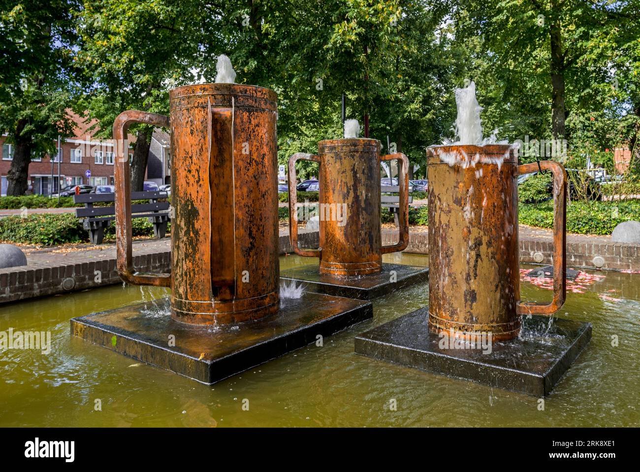 De 3 Potten van Olen / Three Copper Pots of Olen, sculpture fountain on the village square of the town Olen, province of Antwerp, Flanders, Belgium Stock Photo