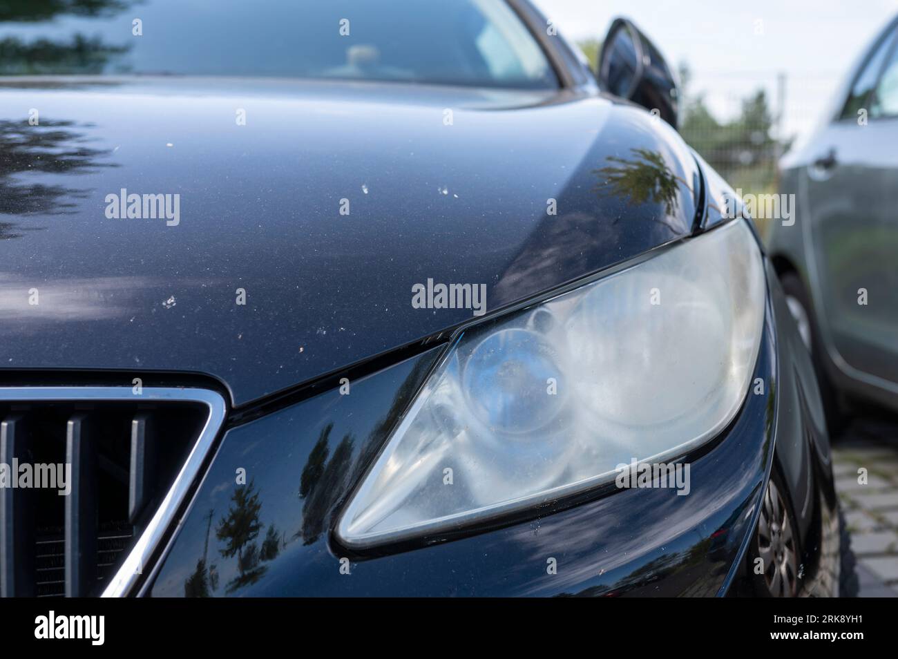 Headlight of a car which has blind over the years Stock Photo Alamy
