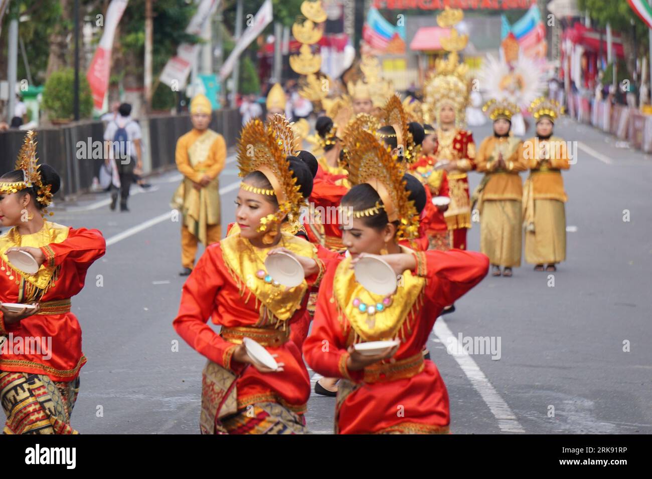 Piring dance from west sumatera at BEN Carnival. This dance is a ritual of gratitude for the people to the gods after getting an abundant harvest Stock Photo
