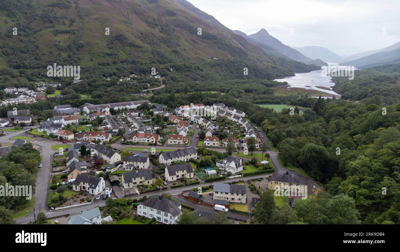 The Scottish village of Kinlochleven as seen from a drone point of view. In the background the Loch Leven (Lake Leven) can be seen, flanked by the Mam Stock Photo