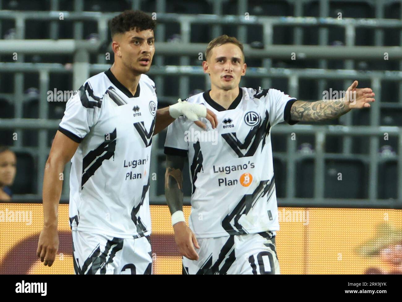 Brussels, Belgium. 24th Aug, 2023. Lugano's Allan Arigoni and Lugano's  Mattia Bottani pictured during a soccer game between Belgian Royale Union  Saint Gilloise and Swiss FC Lugano, Thursday 24 August 2023 in