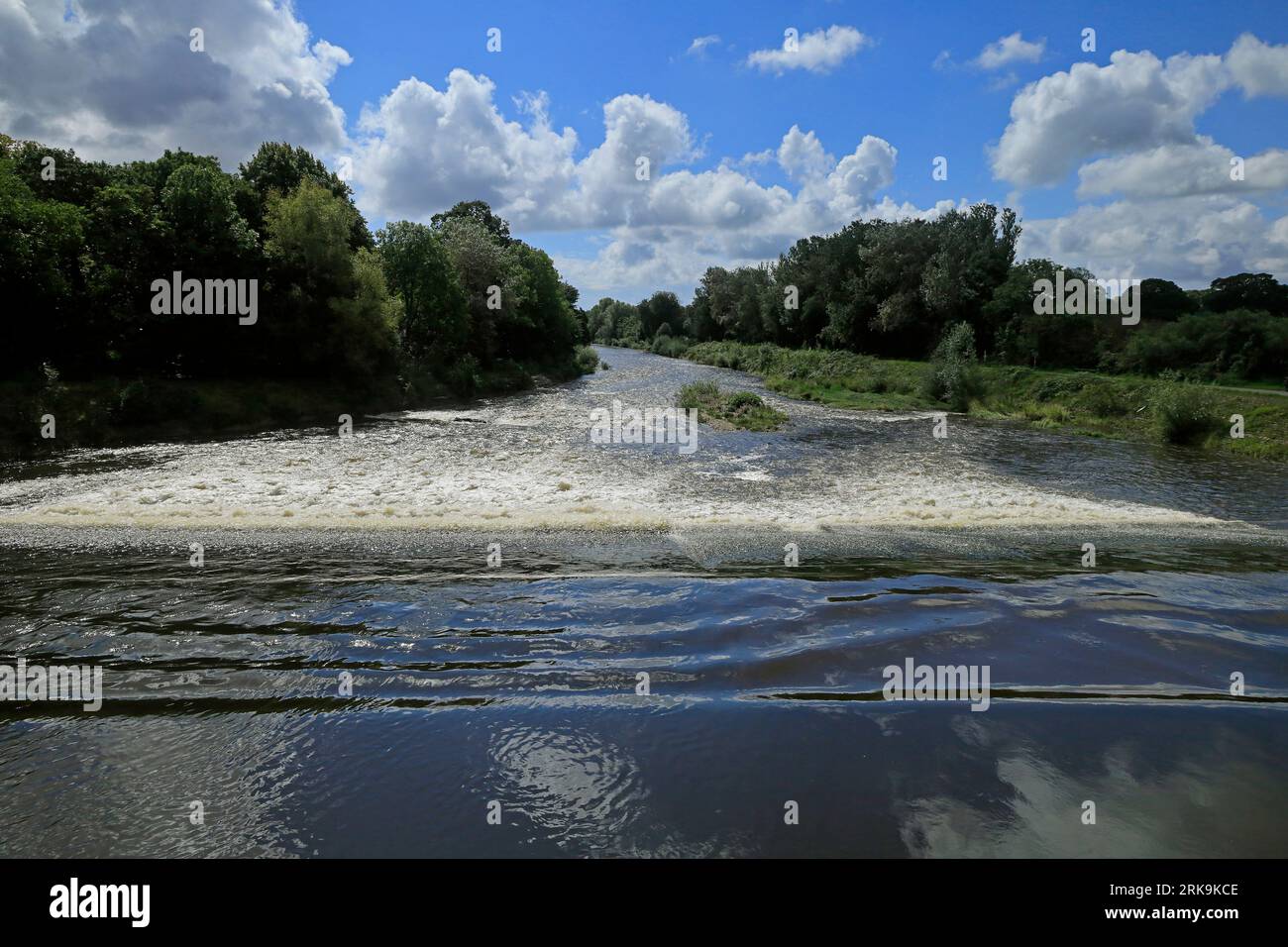 The River Taff from Blackweir footbridge on a sunny day with fluffy clouds. Taken August 2023 Stock Photo