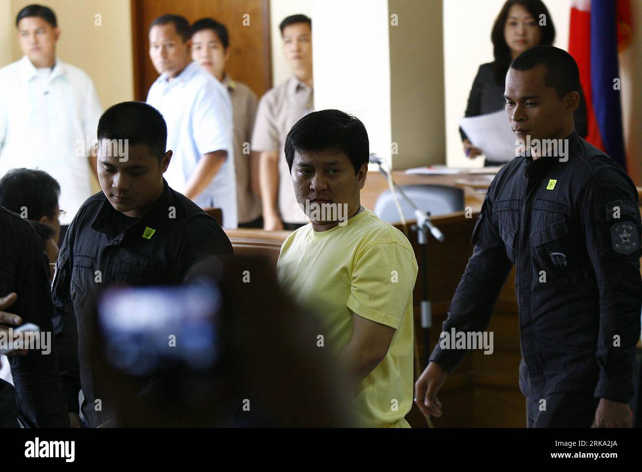 Bildnummer: 54259586  Datum: 28.07.2010  Copyright: imago/Xinhua (100728) -- MANILA, July 28, 2010 (Xinhua) -- Massacre suspect Andal Ampatuan Jr.(C) enters the court room before the start of the arraignment of the Maguindanao massacre inside the prison in Taguig, the Philippines, July 28, 2010. Ampatuan Jr. and 17 other individuals pleaded not guilty to murder charges linked to the massacre of 57 in Maguindanao November 2009. (Xinhua/Rouelle Umali) (lyi) (5)PHILIPPINES-MASSACRE-TRIAL PUBLICATIONxNOTxINxCHN Gesellschaft Manila Prozess kbdig xcb 2010 quer  o0 Massaker    Bildnummer 54259586 Dat Stock Photo