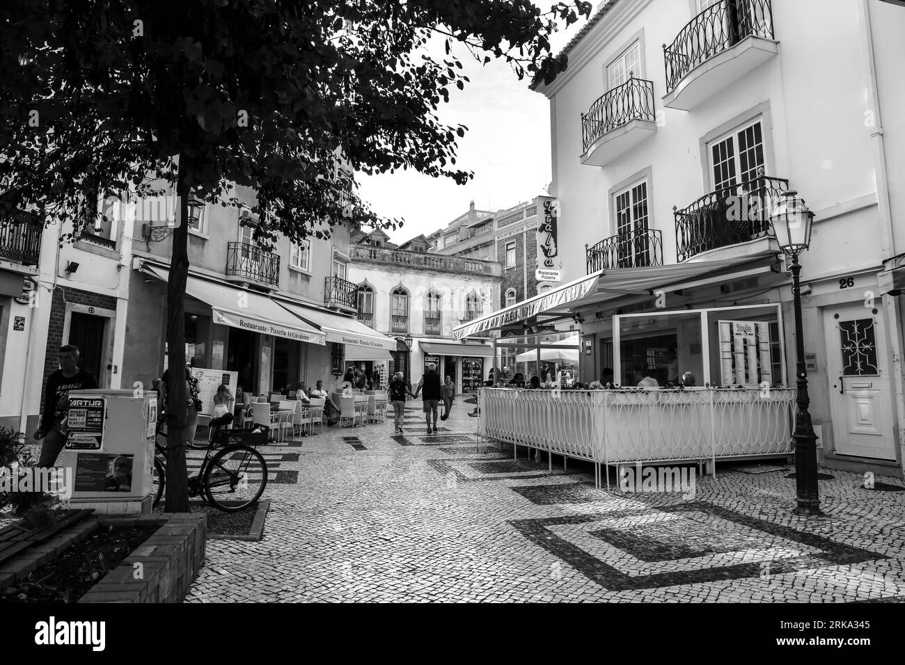 Lagos, Portugal- October 20, 2022: Narrow Cobblestone streets and typical Portuguese facades in Lagos city, Portugal Stock Photo