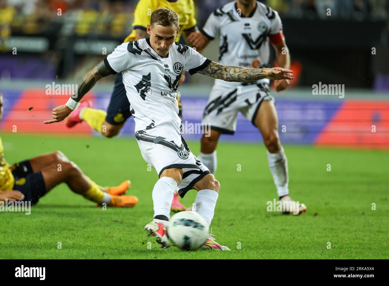 Brussels, Belgium. 24th Aug, 2023. Lugano's Allan Arigoni and Lugano's  Mattia Bottani pictured during a soccer game between Belgian Royale Union  Saint Gilloise and Swiss FC Lugano, Thursday 24 August 2023 in