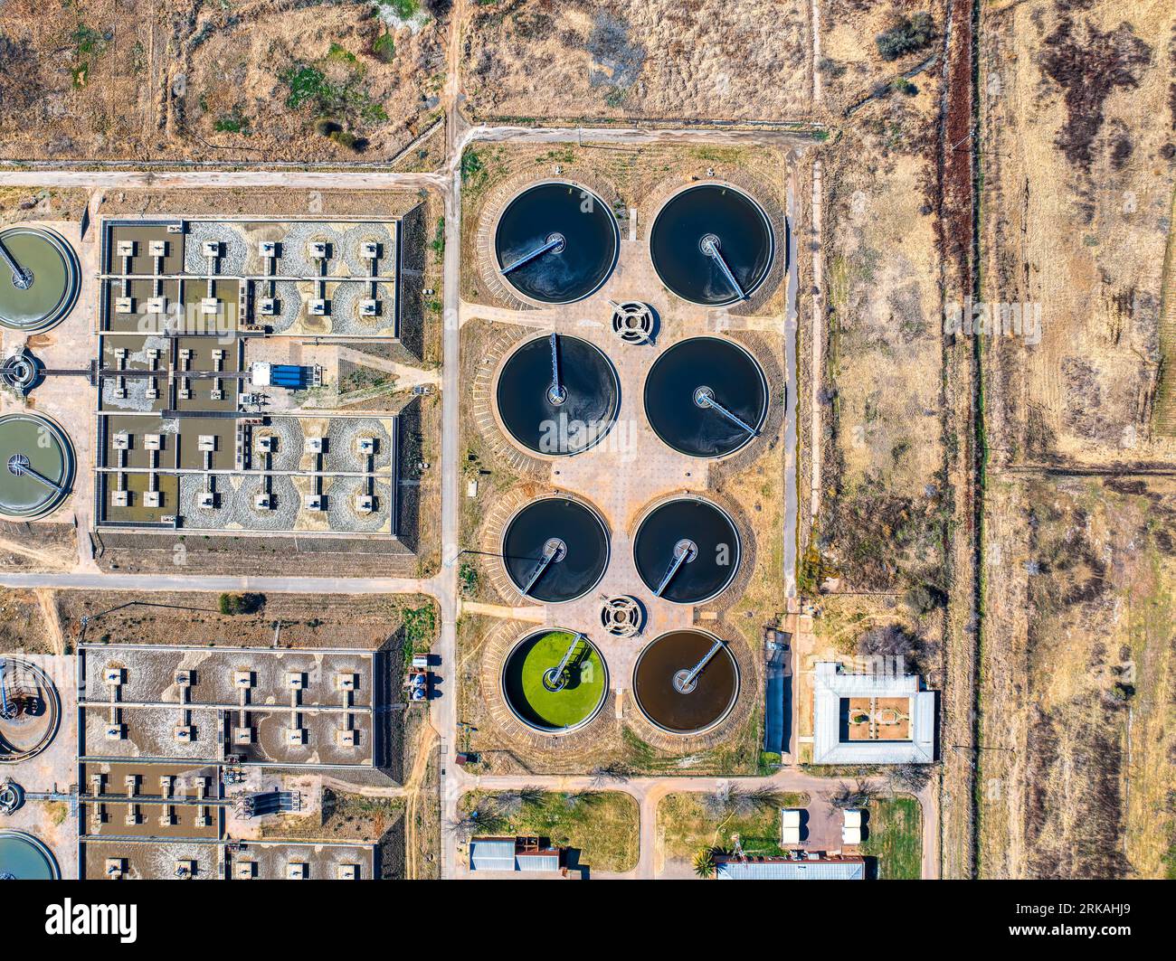 Wastewater treatment plant and system operators remove pollutants from domestic and industrial waste, travels through sewer pipes to treatment plants Stock Photo