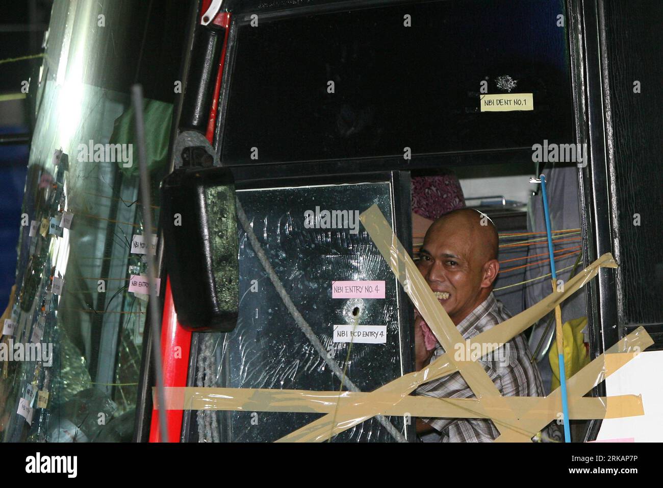 Bildnummer: 54411842  Datum: 08.09.2010  Copyright: imago/Xinhua 100908) -- MANILA, Sept. 8, 2010 (Xinhua) -- Alberto Lubang, the driver of the tourist bus, in which dismissed Policeman Rolando Mendoza held hostage on Aug. 23, wipes his face as he recounts the violent incident during an occular inspection with the members of the Incident Investigation and Review Committee(IIRC) inside the Ordnance Warehouse at the Camp Bagong Diwa in Taguig City, the Philippines Sept. 8, 2010. The IIRC held the inspection to investigate the hostage crisis that killed eight tourists of China s Hong Kong on Aug. Stock Photo
