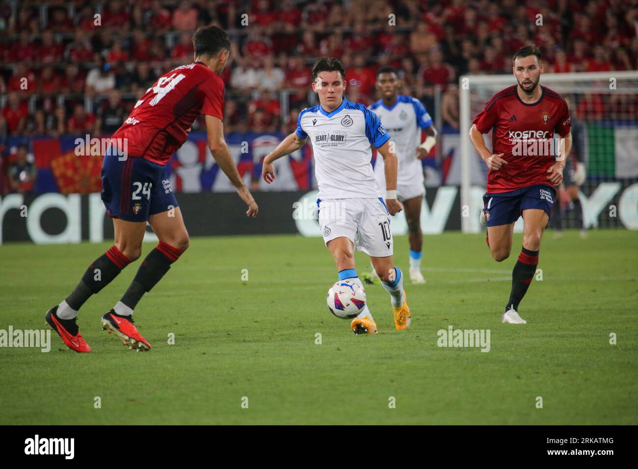 Pamplona, Spain, 24th August, 2023: Club Brugge's player Hugo Vetlessen (10) passes the ball in front of several opponents during the first leg of the previous round of the UEFA Europa Conference League 2023-24 between CA Osasuna and Club Brugge at the El Sadar Stadium, in Pamplona, on August 24, 2023. Credit: Alberto Brevers / Alamy Live News. Stock Photo