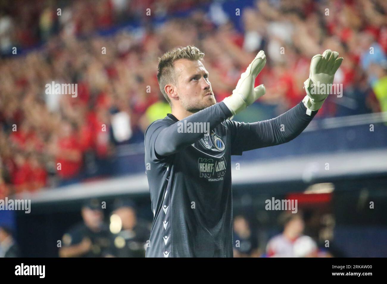 Pamplona, Spain, 24th August, 2023: Club Brugge's goalkeeper, Simon Mignolet (22) greets the fans during the first leg of the UEFA Europa Conference League 2023-24 preliminary round between CA Osasuna and Club Brugge at the El Sadar Stadium, in Pamplona, on August 24, 2023. Credit: Alberto Brevers / Alamy Live News. Stock Photo
