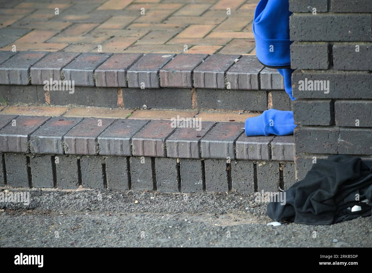 Parade, Birmingham, 24th August 2023: A forensic officer examines the scene after a 16-year-old boy was stabbed outside University College Birmingham on Thursday afternoon. A police spokesman told BirminghamLive: 'We were called to a stabbing outside University College Birmingham in Ladywood, at 2.40pm today (August 24). A 16-year-old has been taken to hospital with serious injuries. 'Our enquiries are at an early stage and anyone with information is asked to contact us via Live Chat on our website, or by calling 101, and quote log 2794 of 24 August.' Credit: Stop Press Media/Alamy Live News Stock Photo