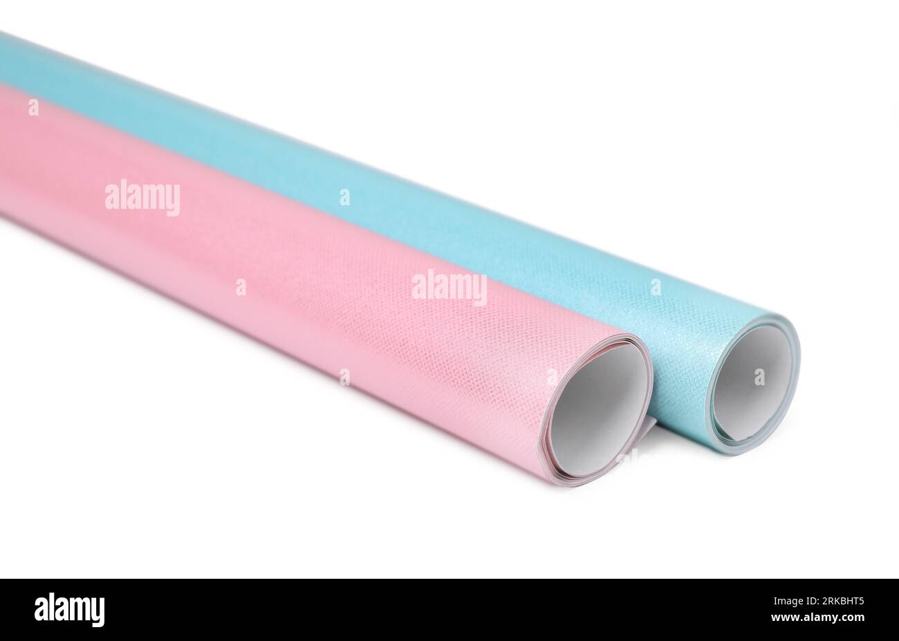 Rolls of colorful wrapping papers on white background Stock Photo - Alamy
