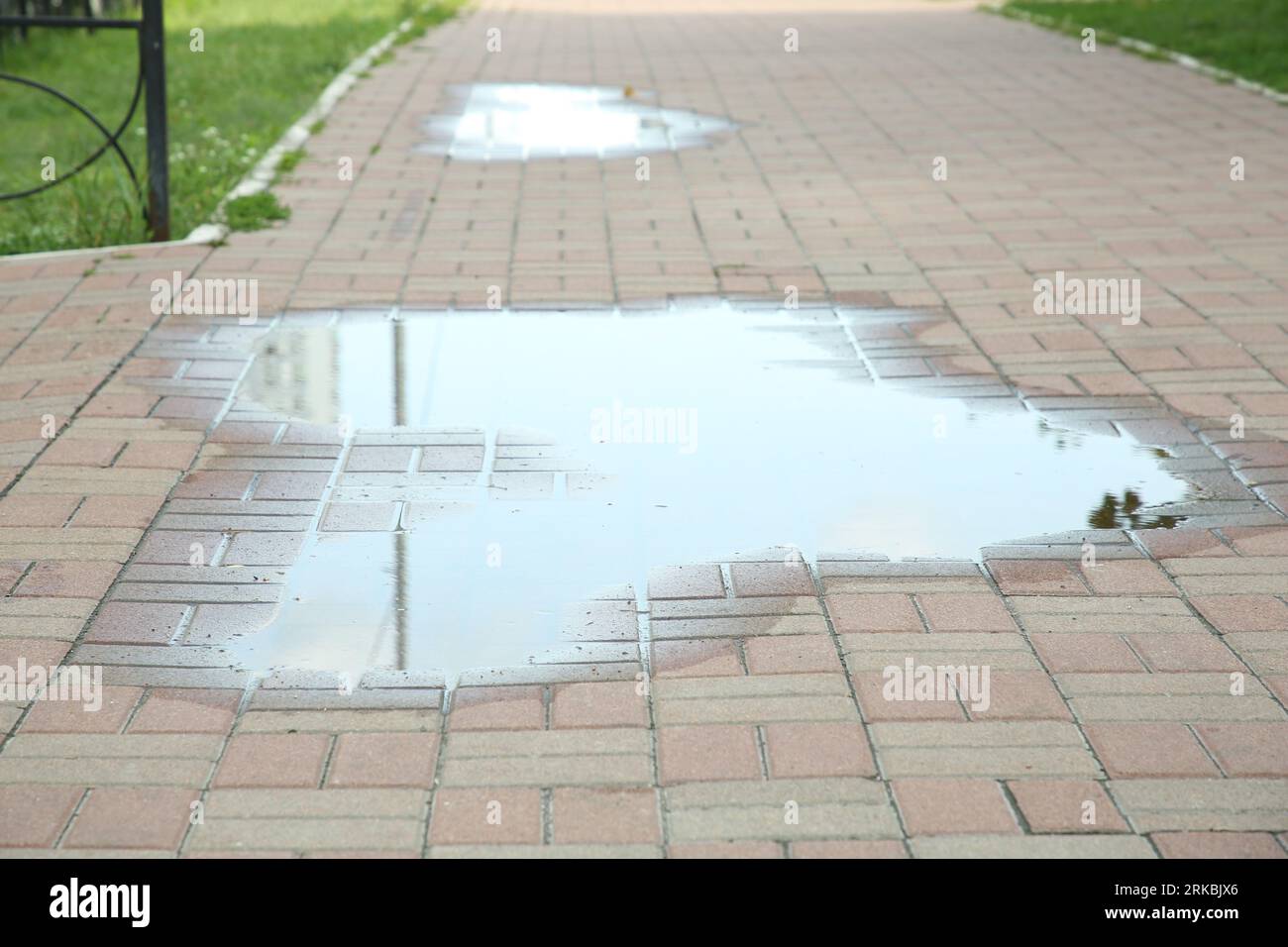 Water puddle on tiles hi-res stock photography and images - Alamy